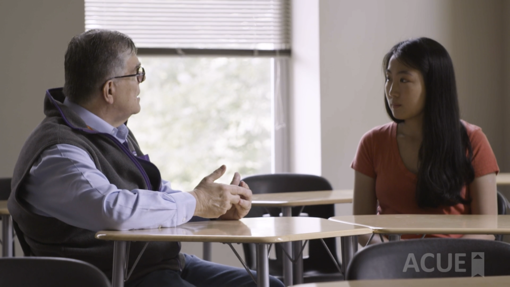 A professor meeting with a student.